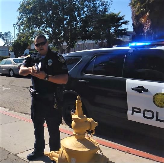 SDCCD Police Officer pulling gun on a photographer.