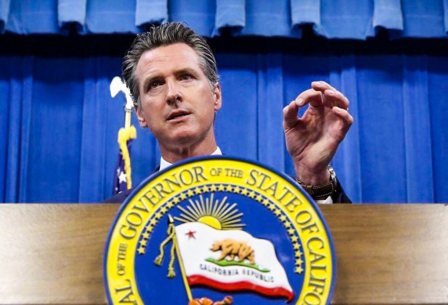 California Gov. Gavin Newsom has signed a law that would let athletes at California universities make money from their images, names or likenesses.