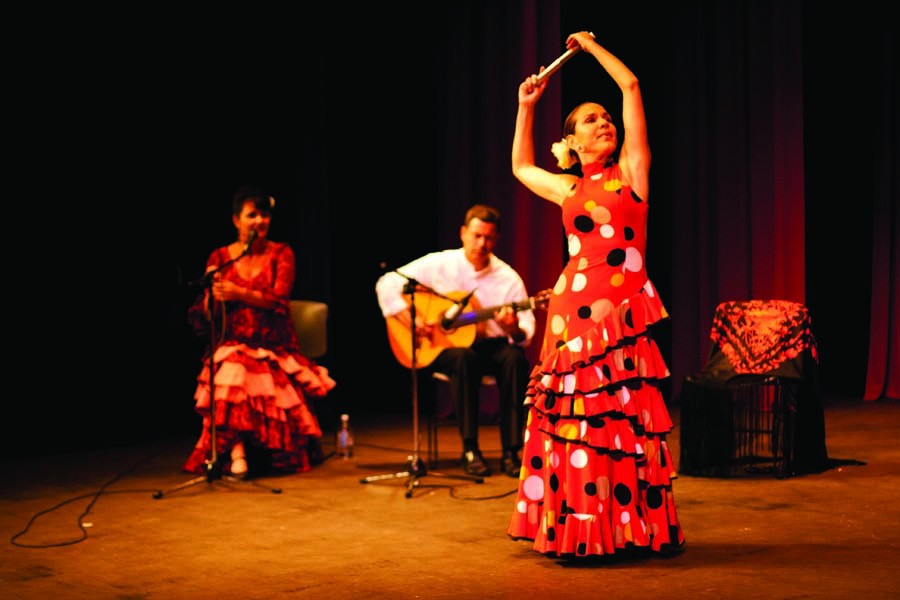 Rocio Carrera begins her routine at San Diego Mesa College Apolliad Theatre with a gallant pose.