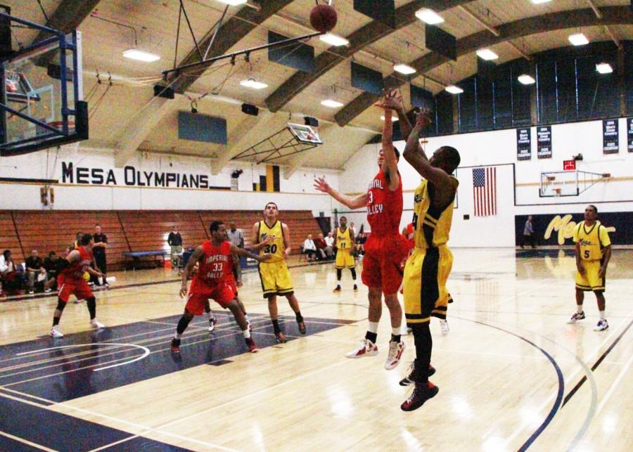 Otis Barrow shoots for three against Imperial Valley College in a 77-76 Win