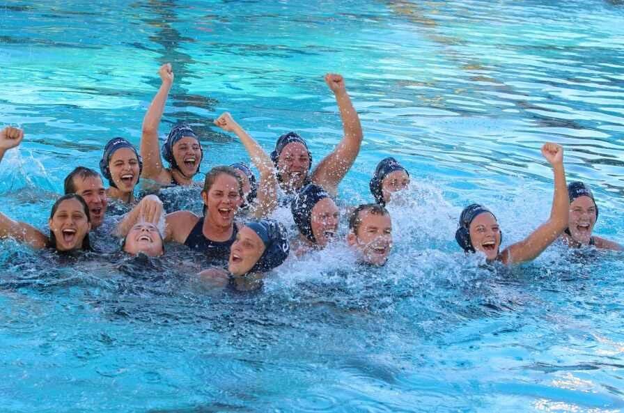 The Mesa womens water polo team celebrates is 9-7 win over Riverside City College to win its first-ever state title.