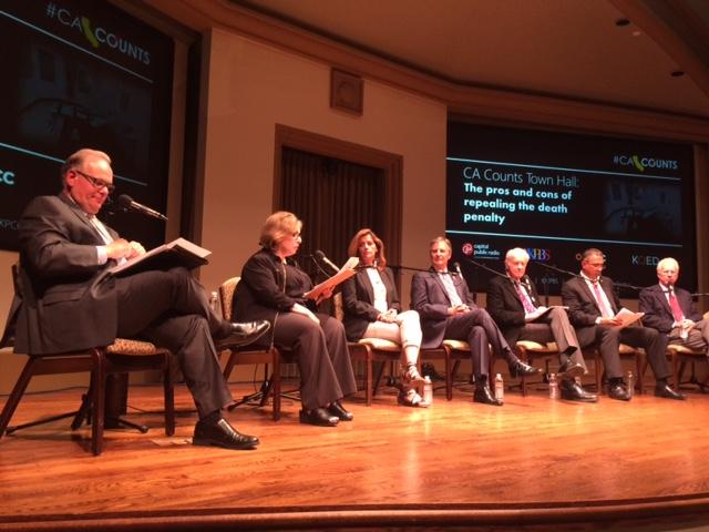 From left to right: moderators Larry Mantle and Maureen Cavanaugh, panelists Beth Webb, Marc Klaas, Mike Farrell, Tom Dominguez, and Paul Pfingst