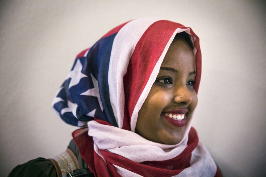 Barwaaqo Dirir, 21, decided to wear an American flag hijab for the first time while attending a talk by Jaylani Hussein on Islamophobia. I woke up this morning and people were looking at me differently, said Dirir. This is my home. Were not going anywhere. 