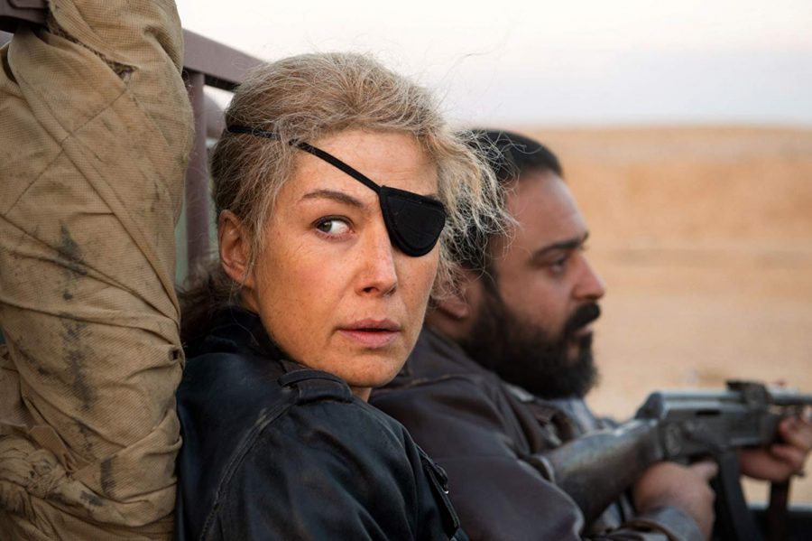 Marie Colvin (Pike) always needing to look over her shoulder in war zones.