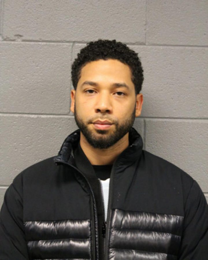 Actor Jussie Smollett pressed against the wall after turning himself in to central booking in Chicago. Photo credit: MCT Campus.