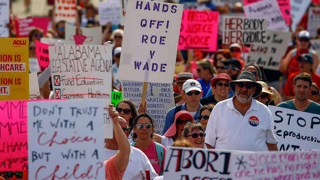 People rally together to protest against the abortion ban at the Alabama Capitol. 
Photo Credit :  Chicago 5 news website