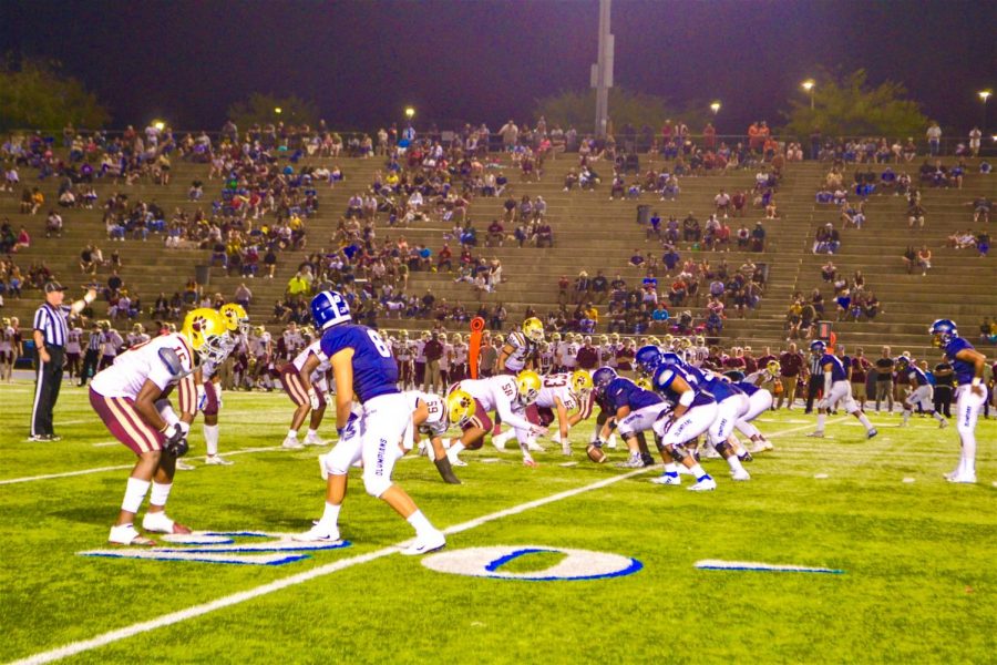 Olympians line up against Jaguars defense.