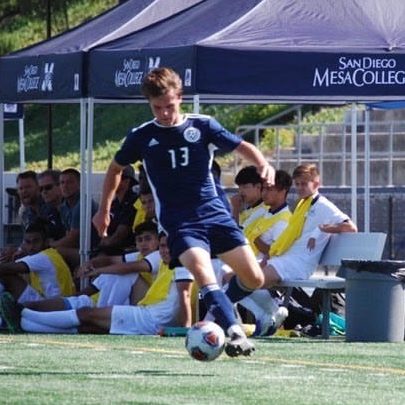 Guthrie controlling the soccer ball during a game.