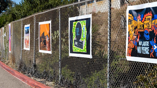 Art pieces line Mesa Colleges parking lot during this semesters outdoor art exhibition
