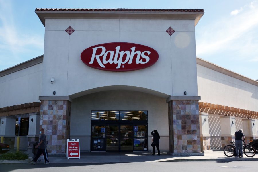 LONG BEACH, CA - FEBRUARY 02: People enter and exit a Ralphs store which Kroger, its parent company will shut down in response to the city imposing a hero pay increase of 4 dollars per house in on Tuesday, Feb. 2, 2021 in Long Beach, CA. The Ralphs is located at 3380 N. Los Coyotes Diagonal. (Dania Maxwell / Los Angeles Times)