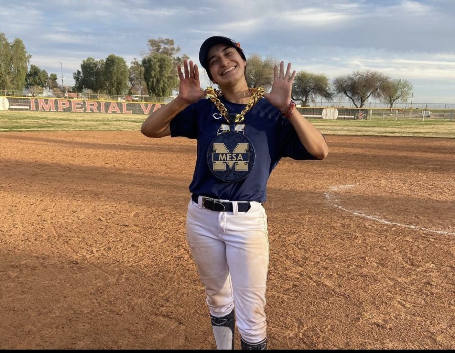 Arianna Izaguirre herself posing for a picture after a game. 