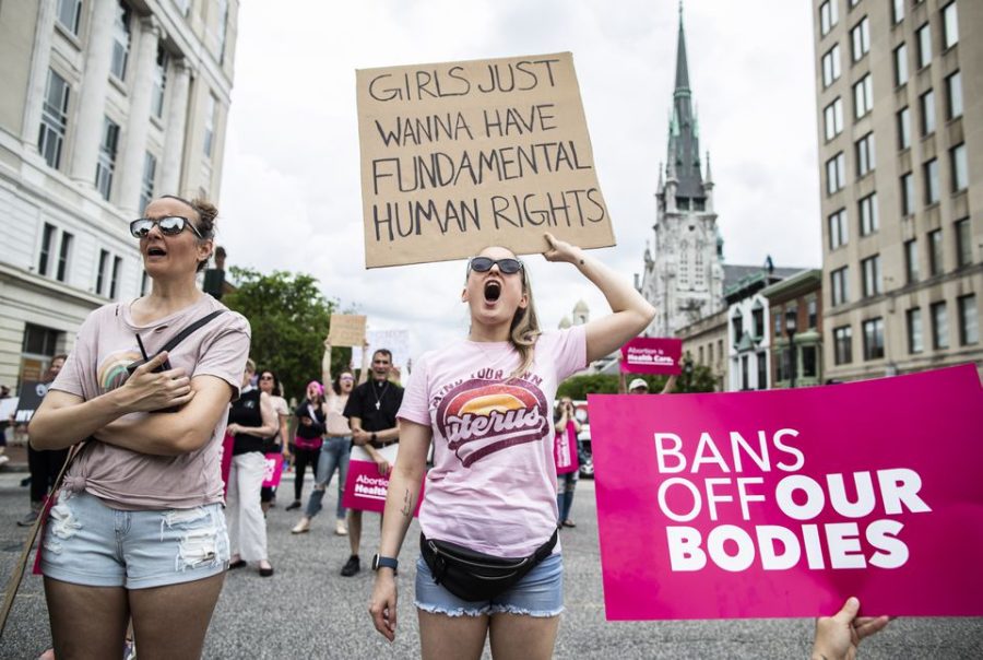 Abortion-rights advocates gather at the Capitol building for a Bans Off Our Bodies rally to protest looming overturn of Roe v. Wade on Saturday. 