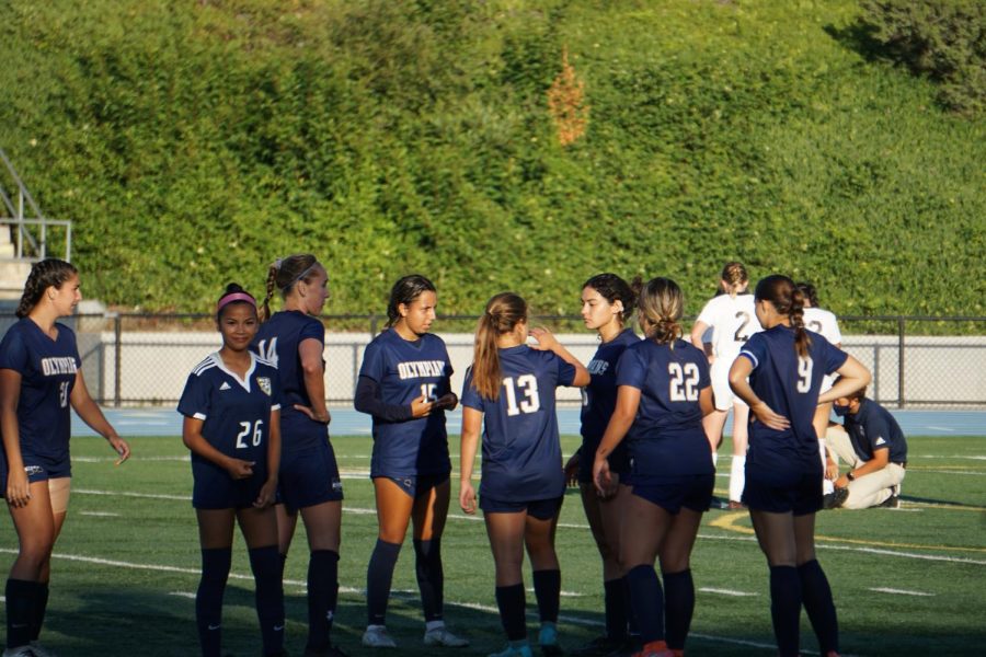 (From Left to Right) Charlotte Taila(21), Angela Buendia(26), Catalina Griffiths(14), Julia Hermosillo(15), Jaleen Rihan(13), Giselle Moran(6). Paradyse Wong(22) and Vanessa Stone(9) reconvene during a stoppage in time for an injured player. 