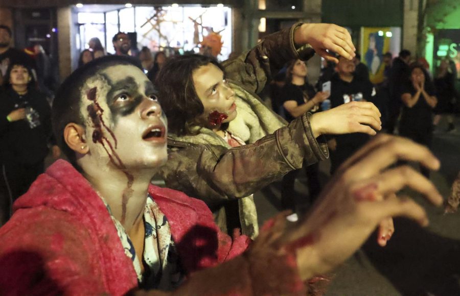 Zombies+roaming+festival+streets
