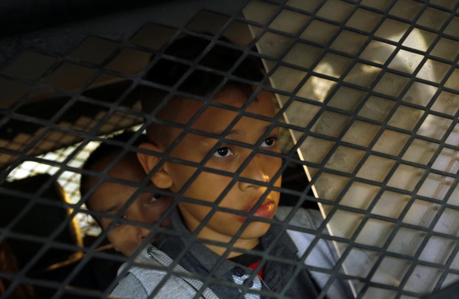 A young boy is detained along with his family members in Texas. (Carolyn Cole/Los Angeles Times/TNS)