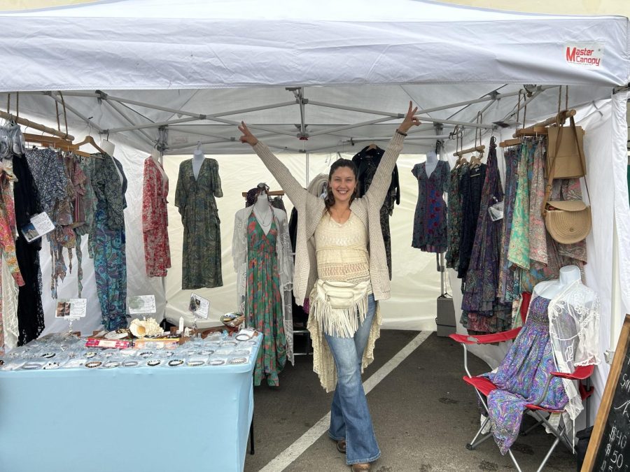 Alexis Medall, owner of AJ & Company, with her personally customized stand at the Ocean Beach Farmers Market.