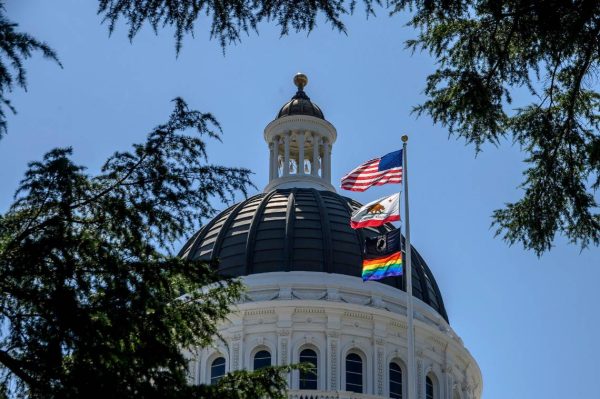 The rainbow flag flies on the main flagpole of the California state Capitol to celebrate LGBTQ Pride month.