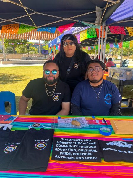 (left to right) Aaron Pischke, Alondra Sanchez and Kevin Sebastian, members of Mesas MeCHa club at the Bienvenida event on Sept. 14.
