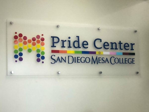 Pride Center sign in room D-102
