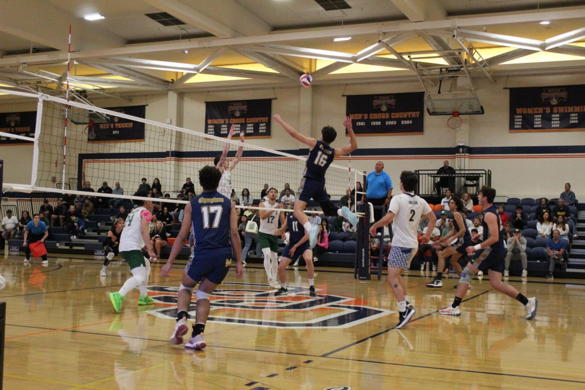 Ricardo Lorna #16 raises up and strikes a kill versus Golden West. Lorna was named the Pacific Coast Athletic Conference player of the year.